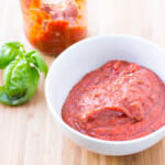 This is our favorite pizza sauce recipe. It's quick easy, and has a secret #ingredient that puts it over the top. ohsweetbasil.com